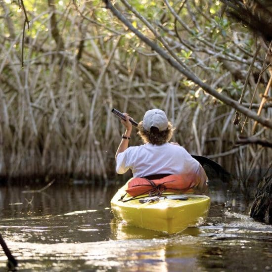 boy kayaking